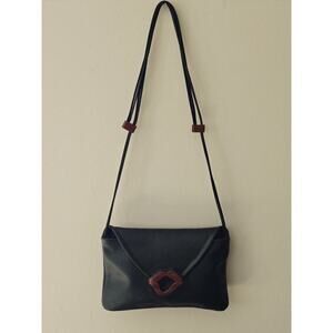 Hand Carved Medium Lip Bag by artist Kimberly Chalos ONE OF A KIND